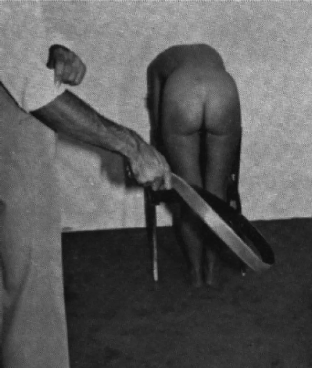 An old photo from 1950s, when conflict in the marriage were settled with a men's belt
