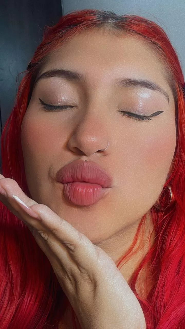 Sweet kiss from juicy loving lips