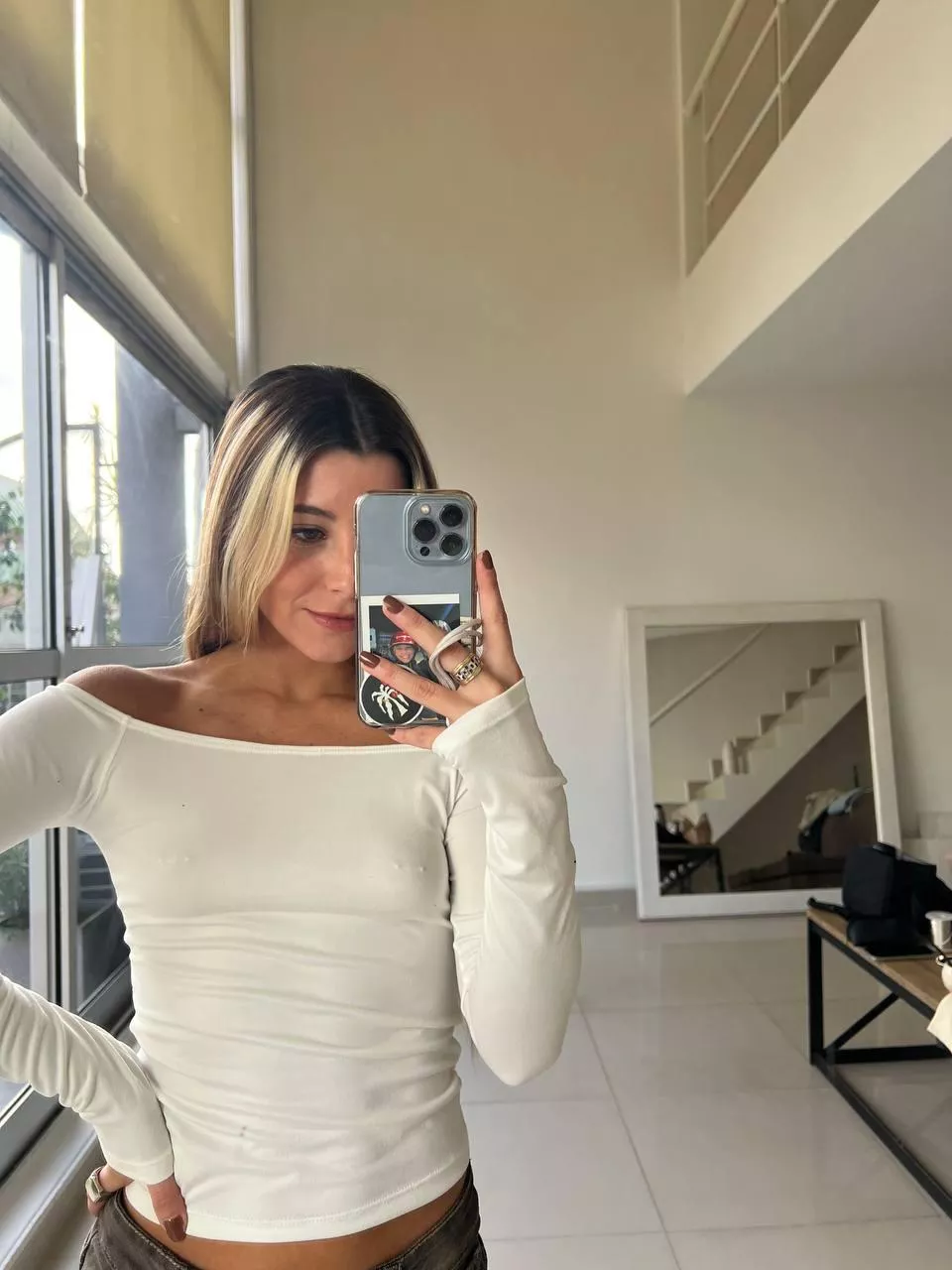 No bra to show the piercings