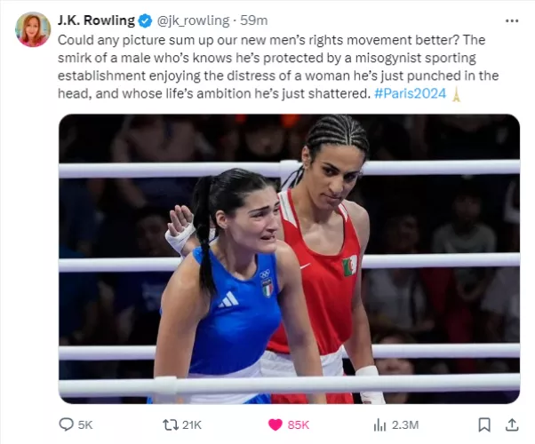 A man beating up a woman in public, then laughing at her for not being as strong as a man, a thing which is physically impossible for her.