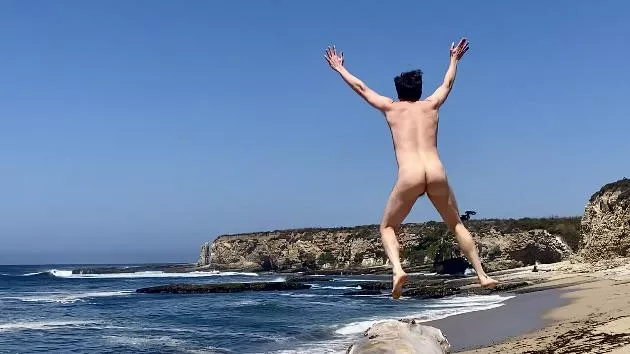 Jumping for joy to be at the beach