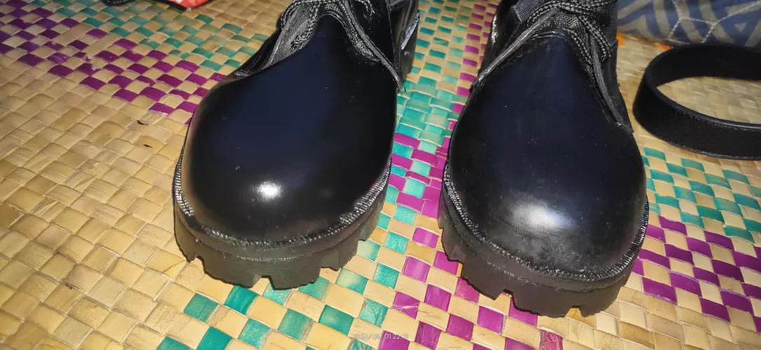 Bought combat shoes, right one is sticky but left isn't, and right also lost its shine after I wiped it, why is it like that and what can I use to have it shine like the left one again?