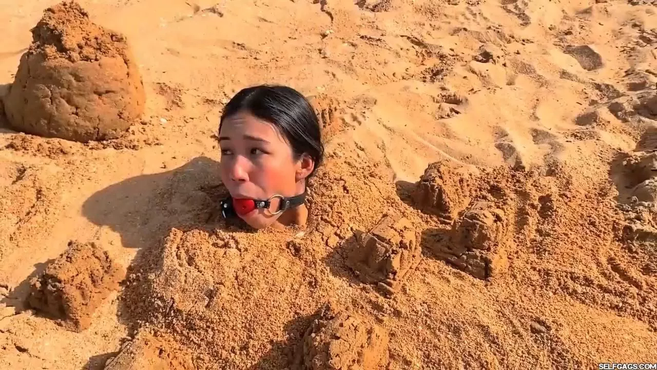 Does being buried in sand count as Outdoor Bondage?