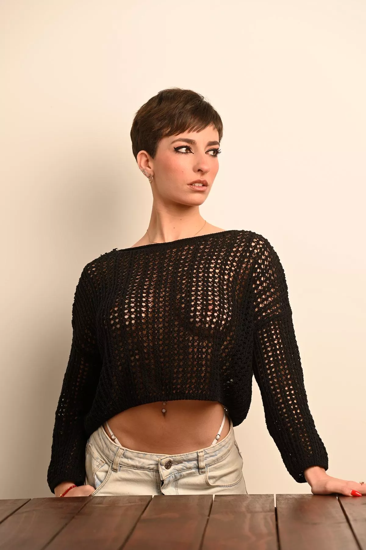 Stunning open knit dress, shame it's practically irresistible... almost as tempting as the person wearing it. haha