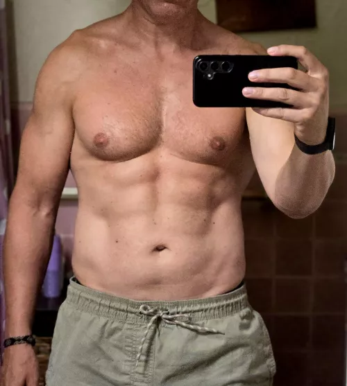 [48] you graduated in June headed to uni in September and you see a friend's Dad you always kinda thought was cute at the pool club and you can't help noticing his abs do you say or do anything?