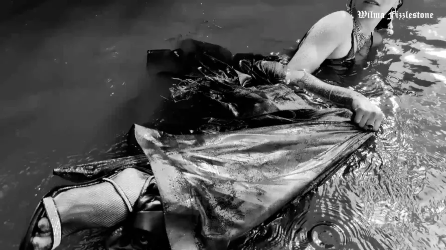 This ball gown got soaking wet and so clingy and heavy that it almost pulled me down...