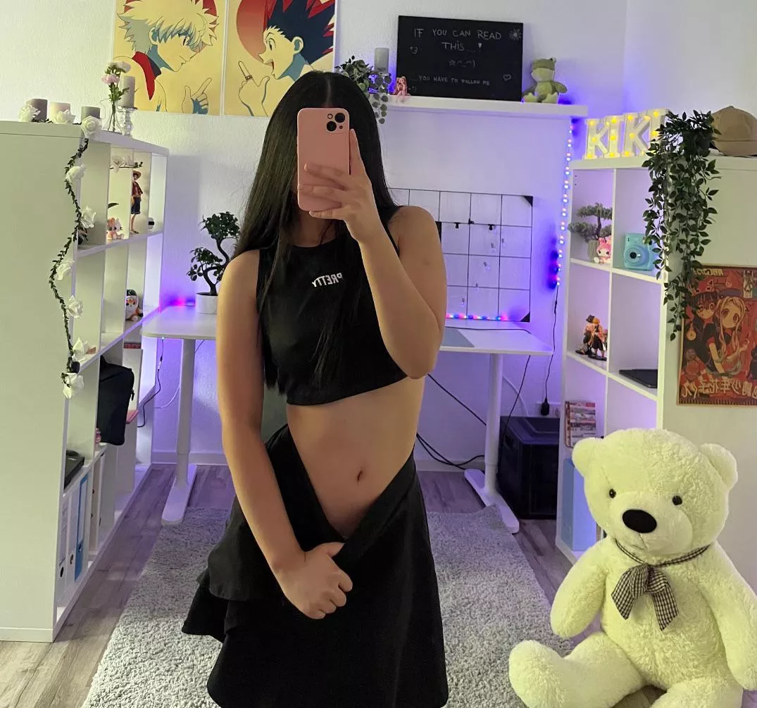 a mix of shy and teasing~