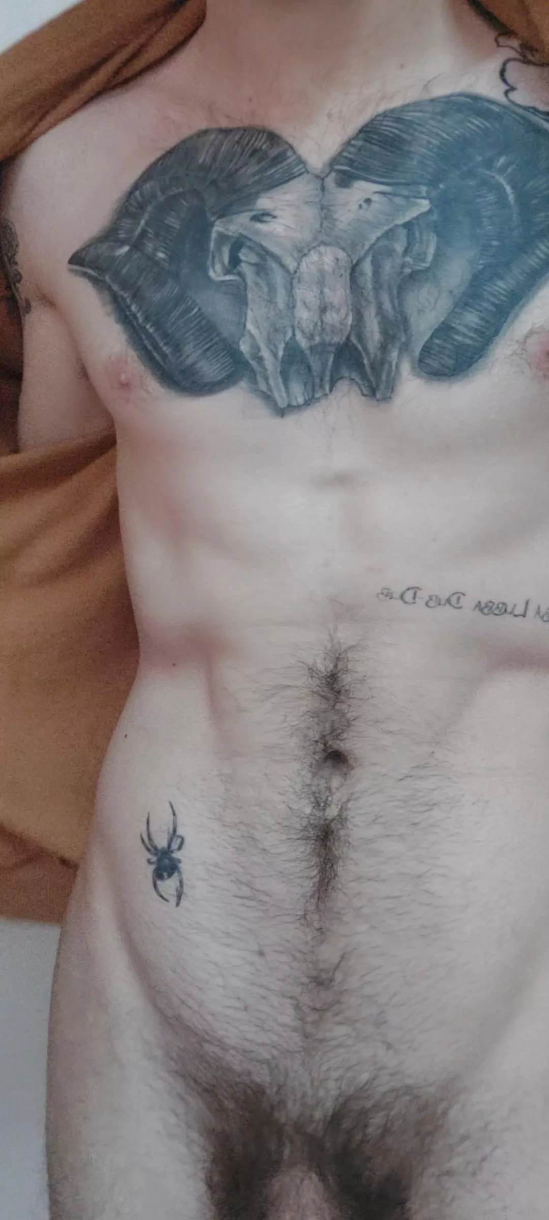 Tatted and slightly hairy