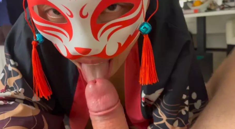 Kitty licking lollipop 