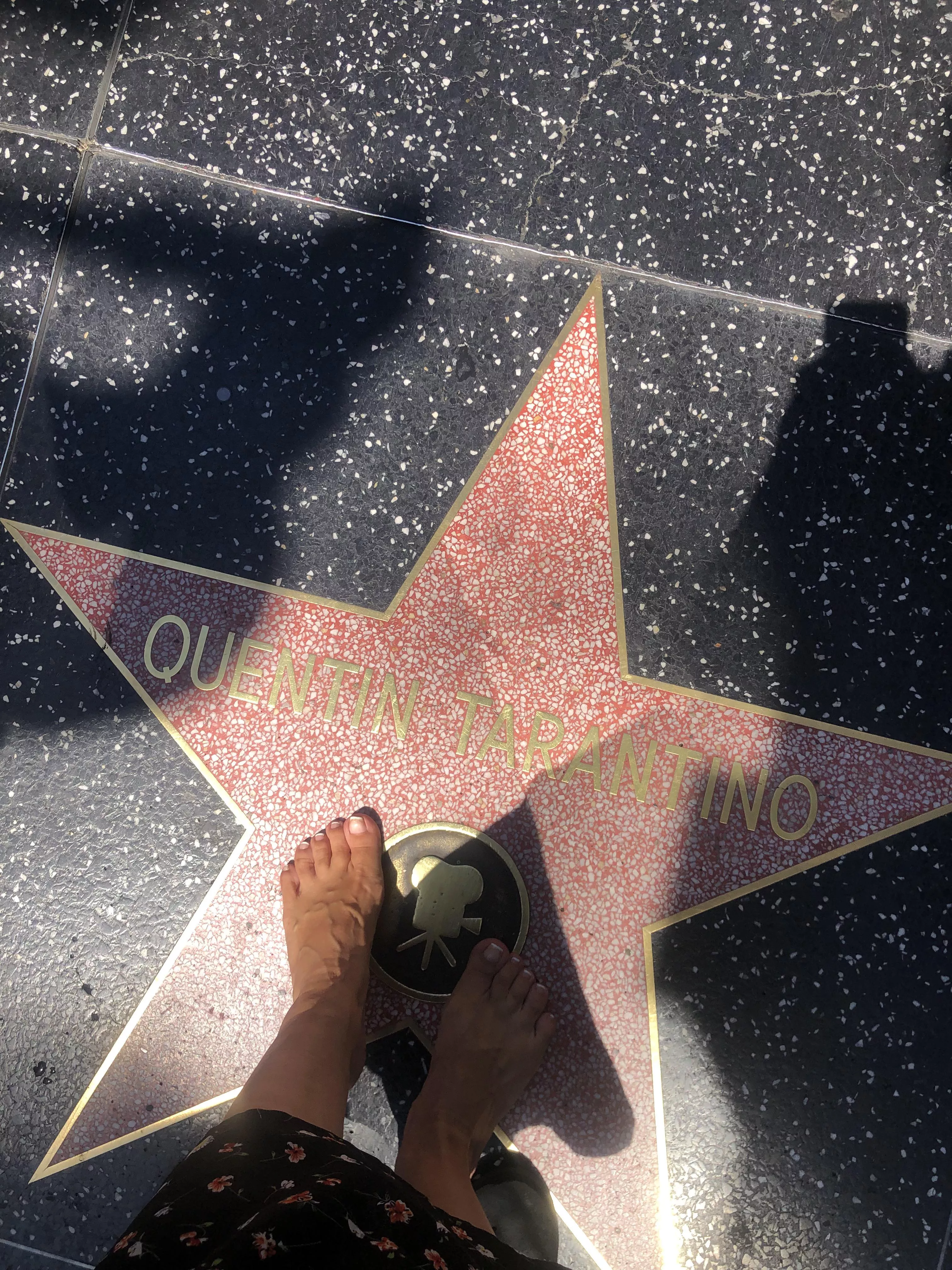 I had to take a picture of my feet next to this star...Do you know why?