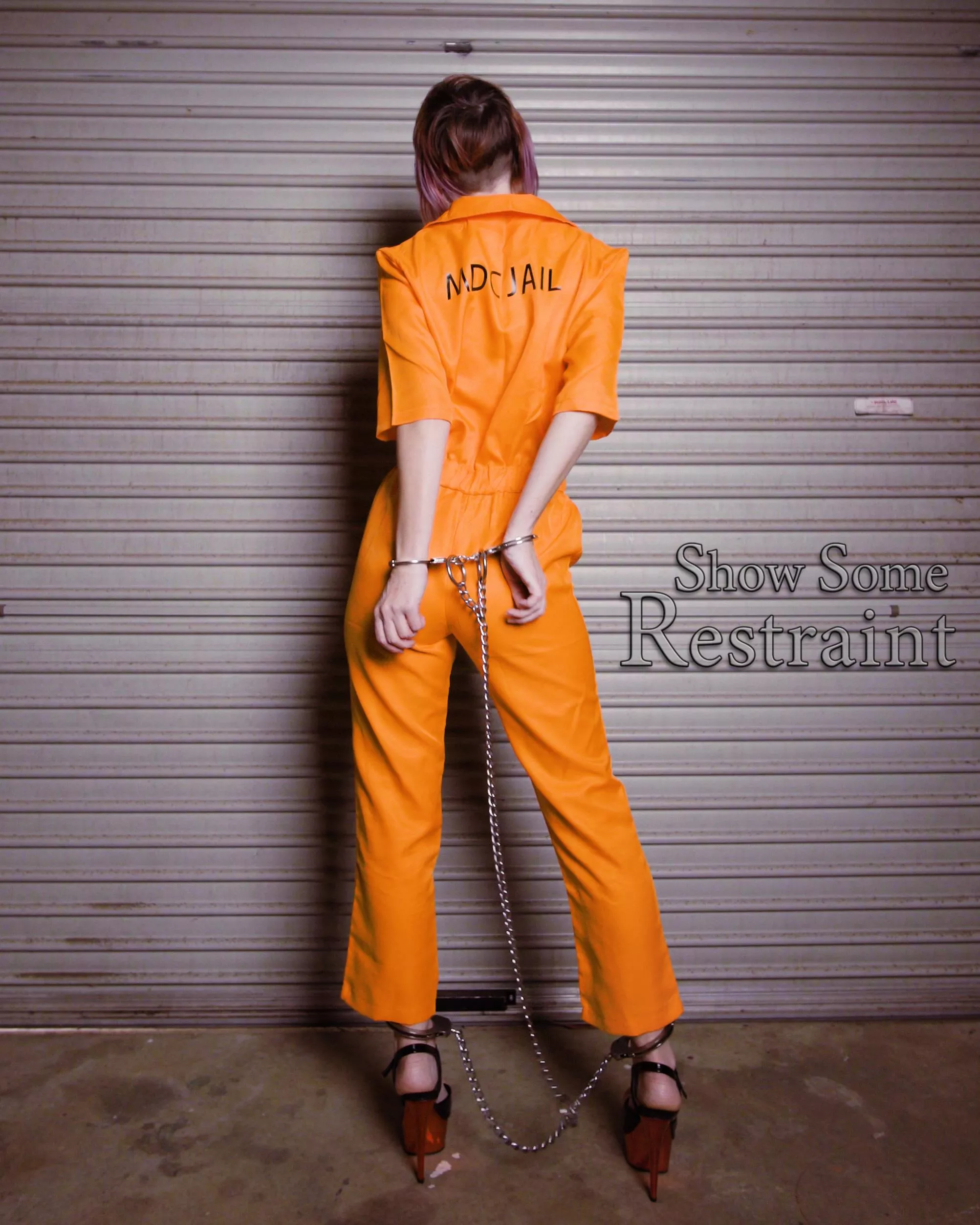 Foxxy securely cuffed, no escapes.