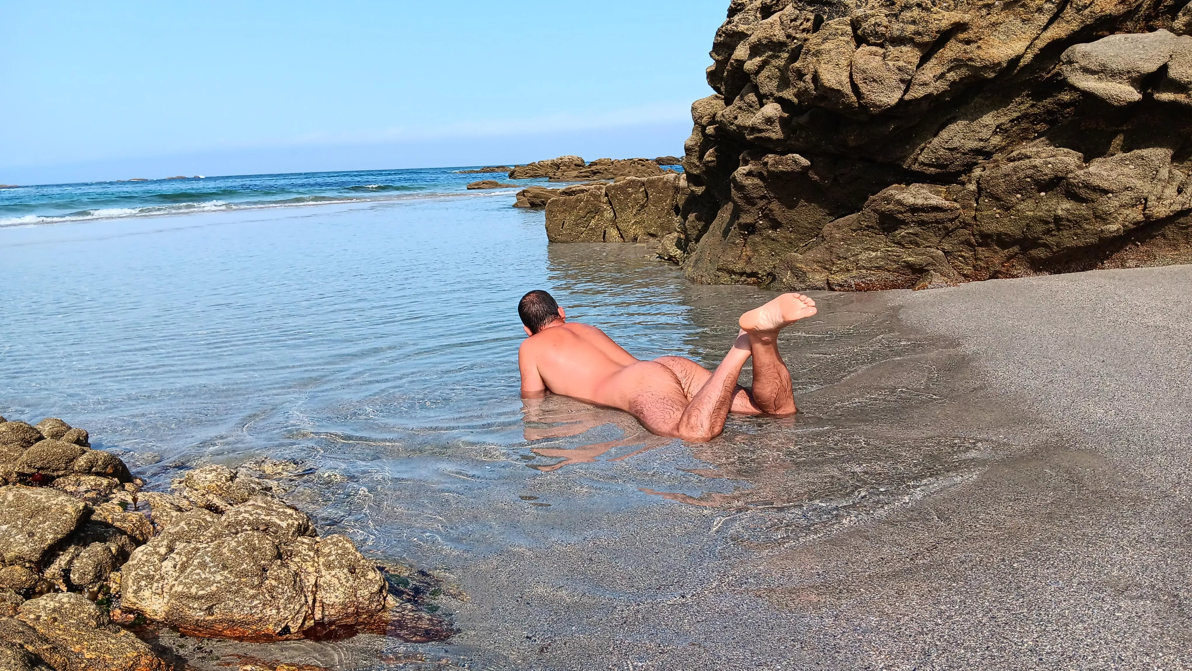 Summer time. Beach nudism