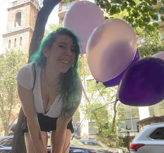 Cute with balloons cleavage