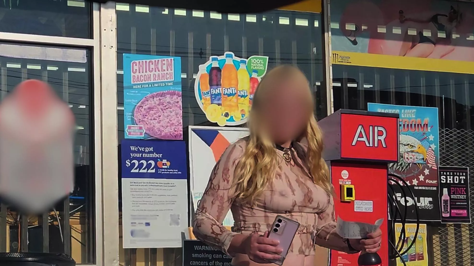 grabbing a quick drink at the corner store in my sheer top