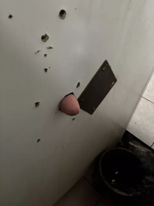 Poking through public gloryhole