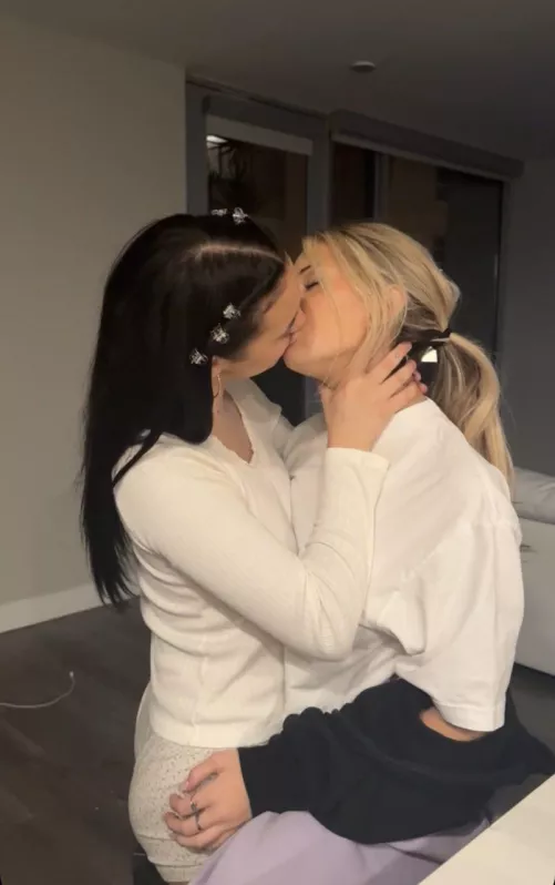 Breckie Hill kissing a friend 