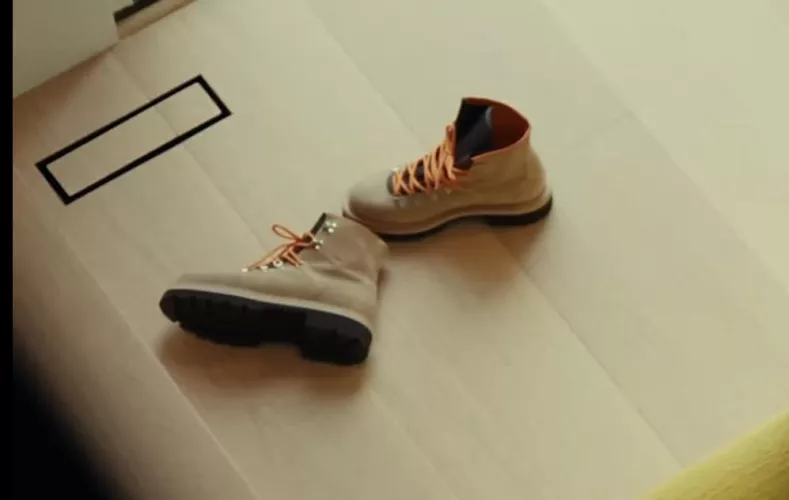 Can anyone help me identify these boots?