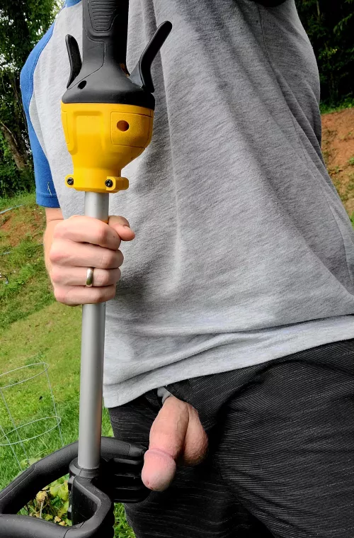 Daddy likes to keep his bushes trimmed.