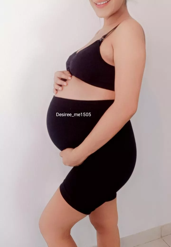 Even with clothes my pregnant body is very attractive