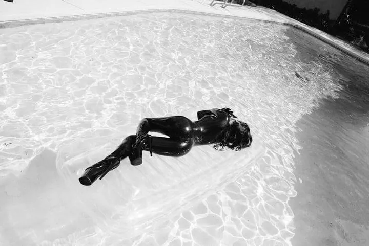 I love wearing latex in the pool! Photo by Erik Tranberg