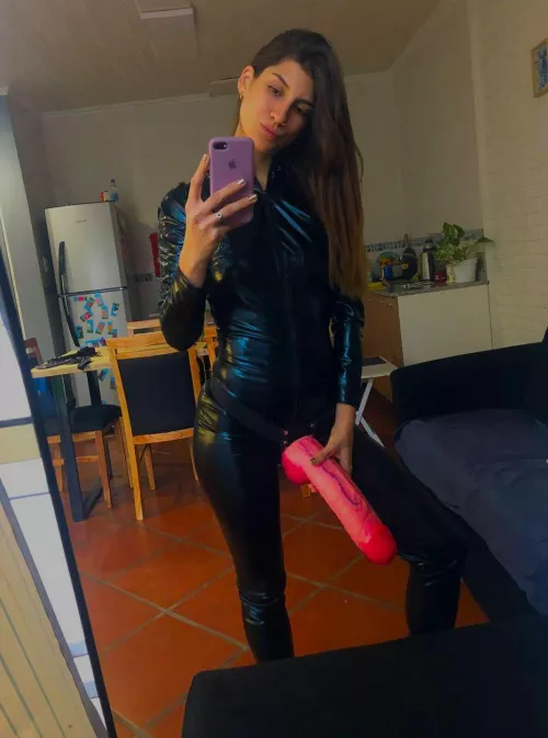 What do you think of a 23 year old wearing latex and a strapon?