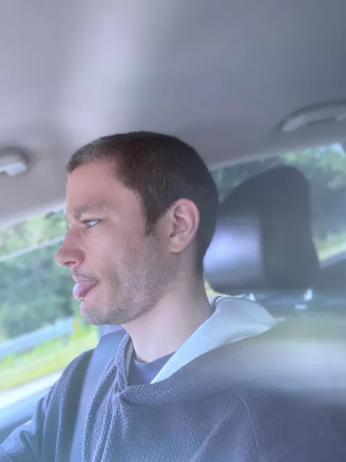 My tongue came out . I like car rides 