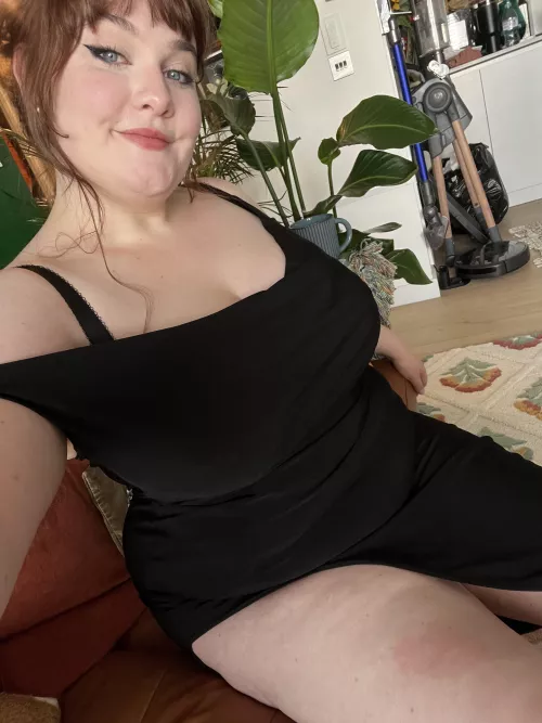 Black dresses look better with a bit of belly 