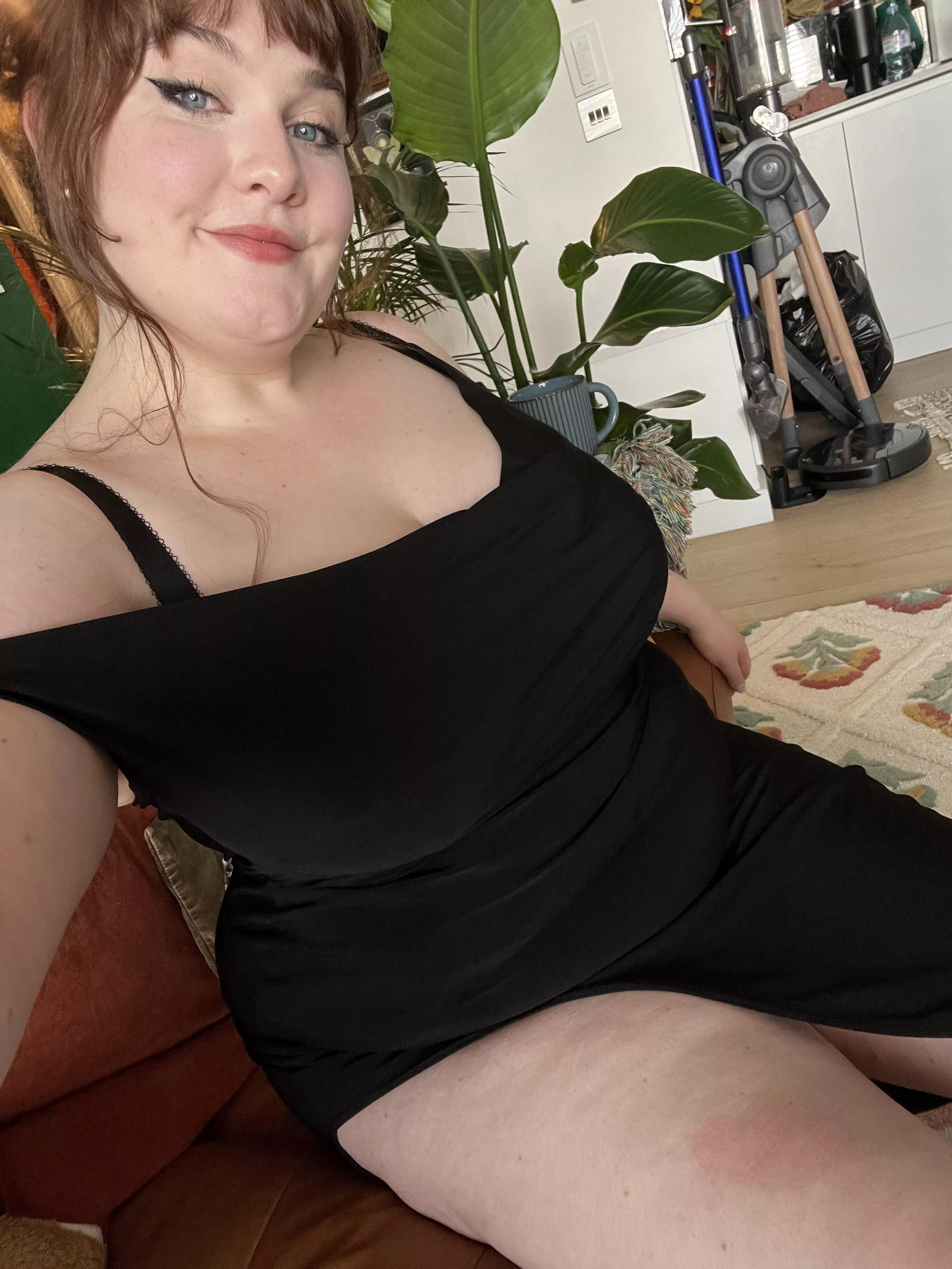 Black dresses look better with a bit of belly 