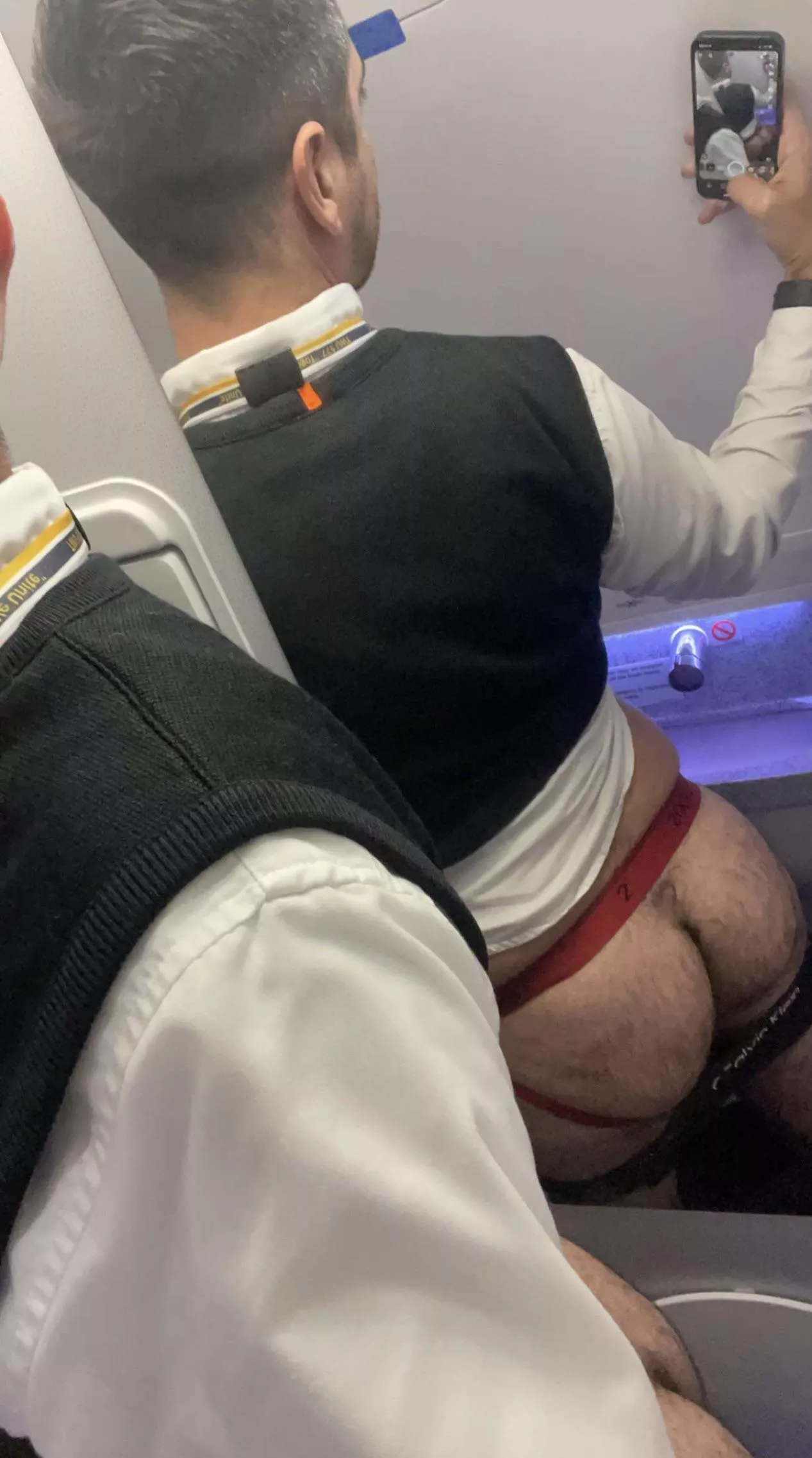 Your flight attendant from behind. 