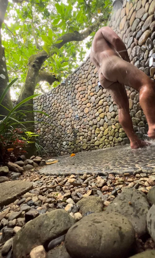 Soaking up in the outdoor shower 