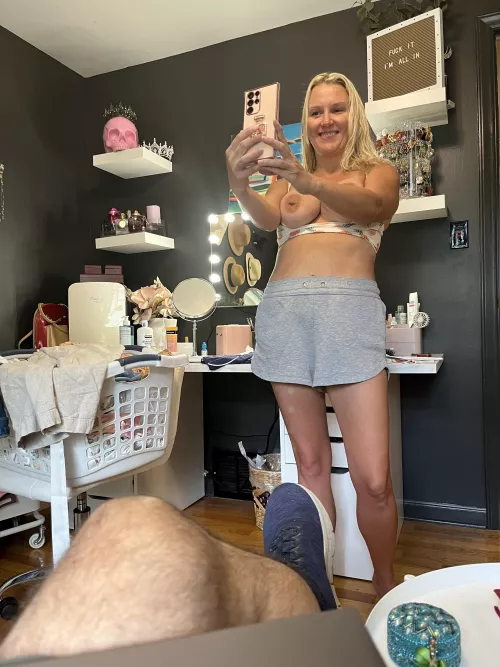 Taking a pic of my slutwife while she takes a selfie for some guy. 