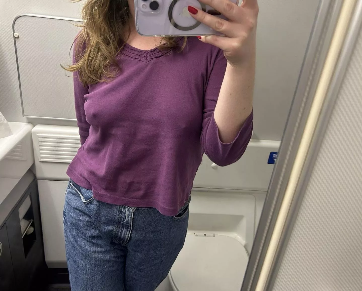 braless airplane selfie 😳✈️