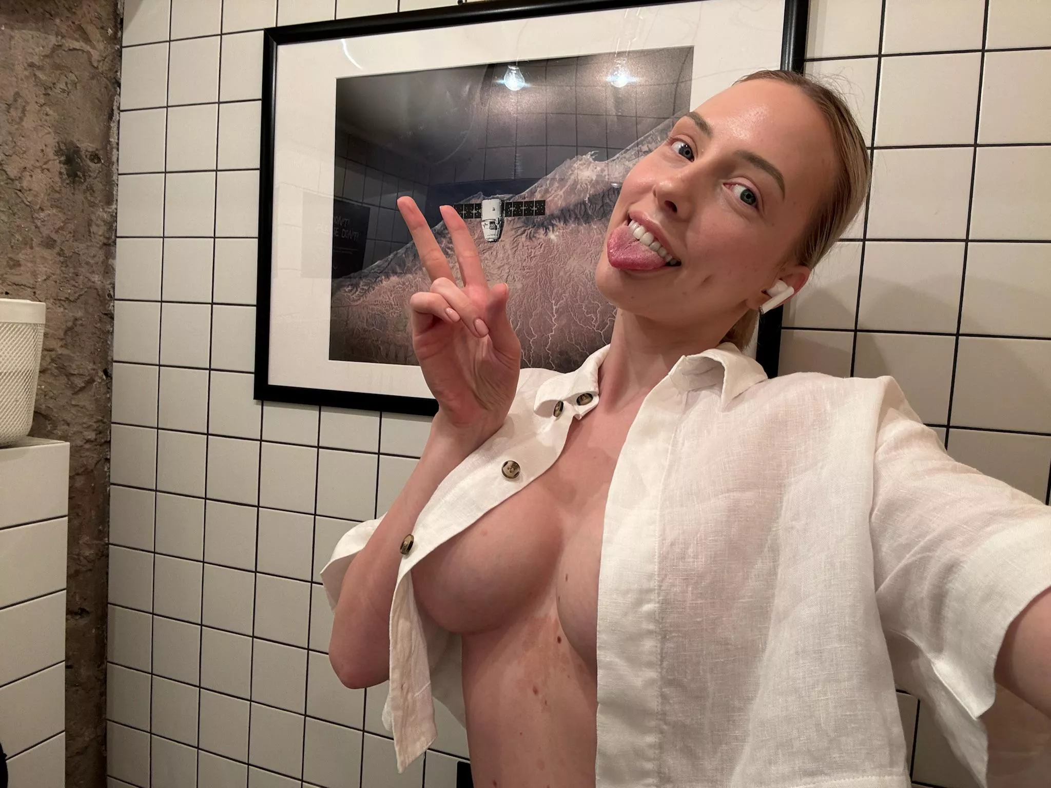 I'm taking selfies in the bathroom for my boss