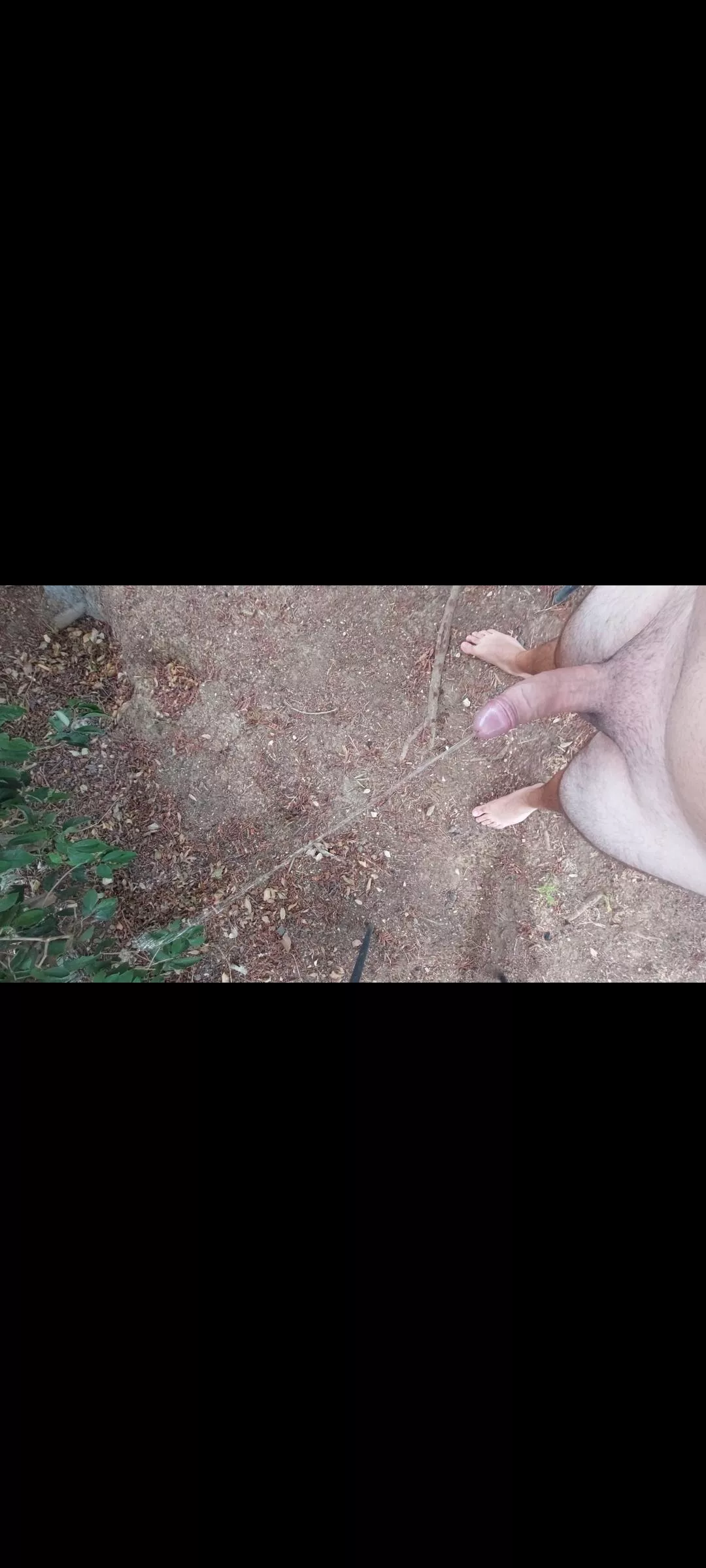 Naked pissing outside