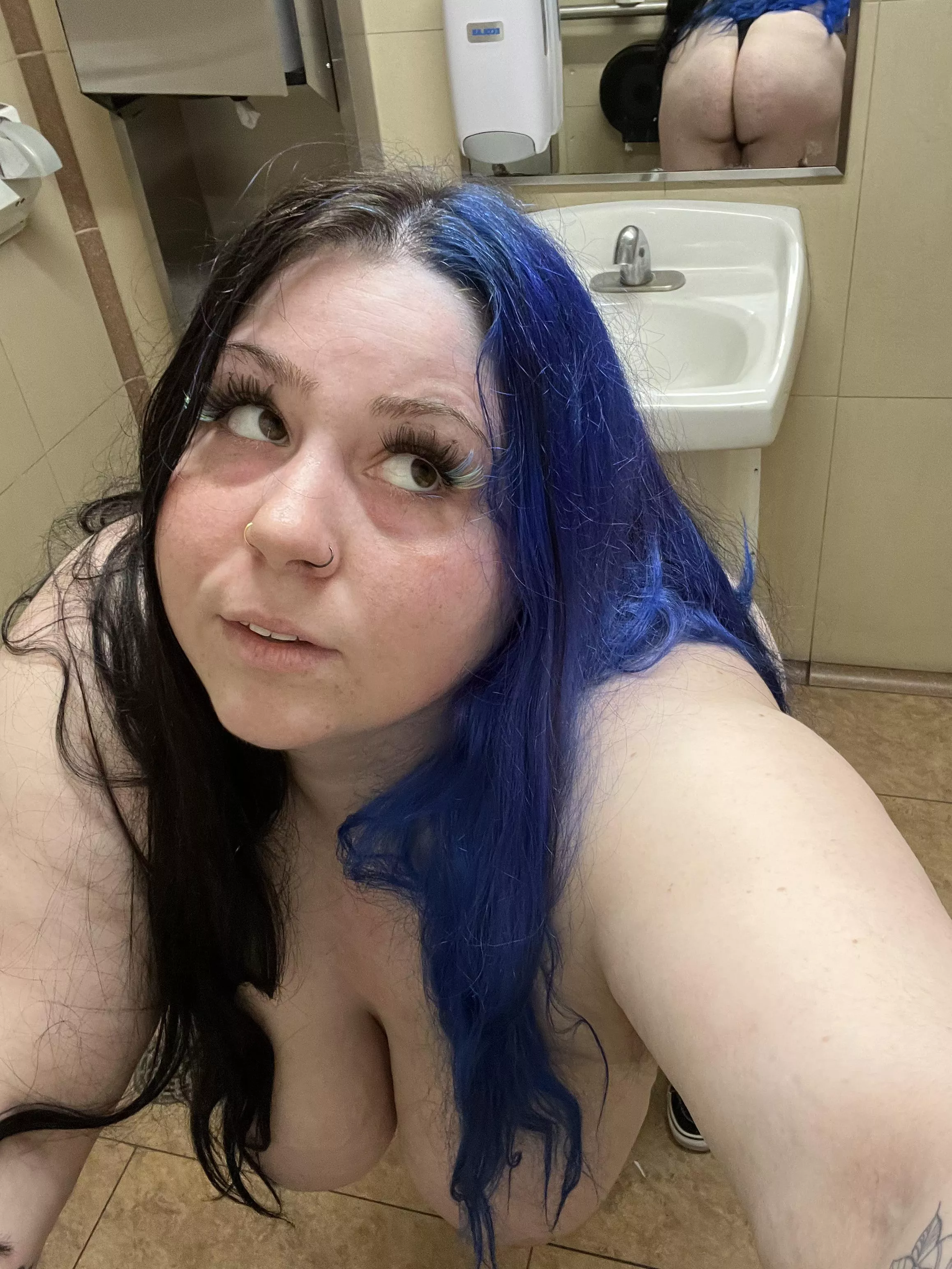 Bending over teasing you making you crave my body. 