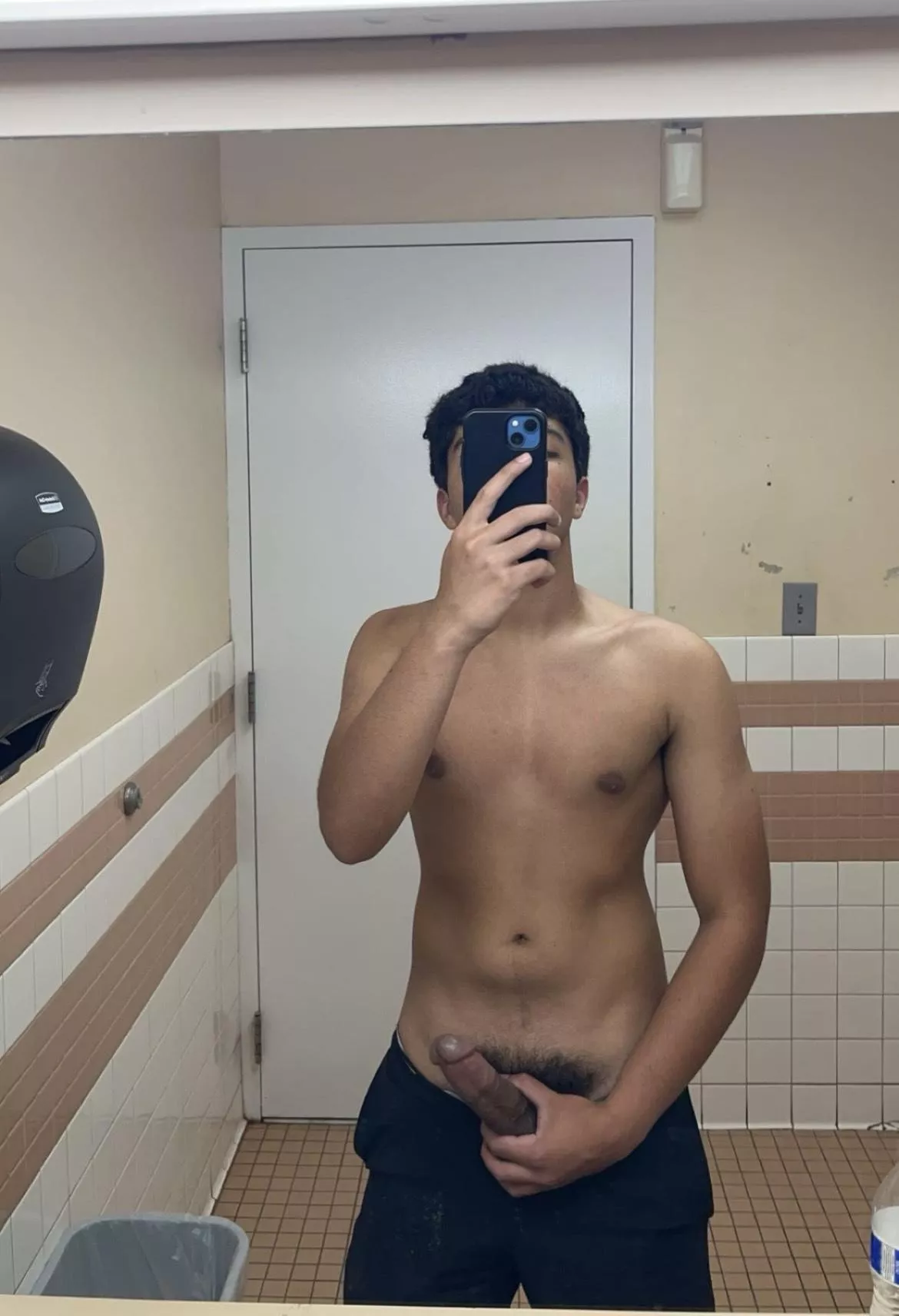 Stroking my long hard cock in the mirror of the public gym bathroom 