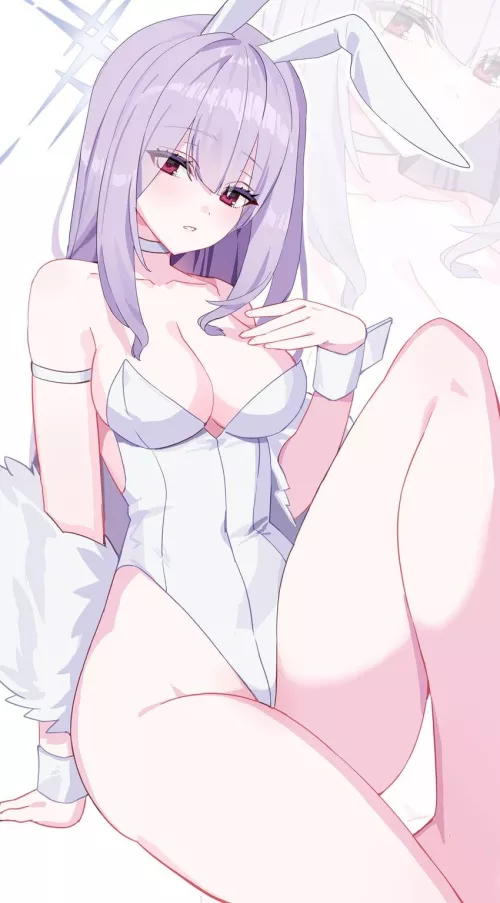 Showing off her white bunny suit 