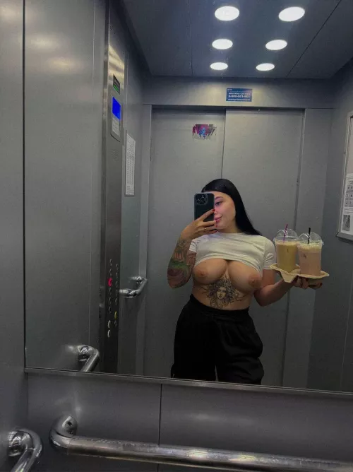 Embarrassed to show my big tits in the elevator 