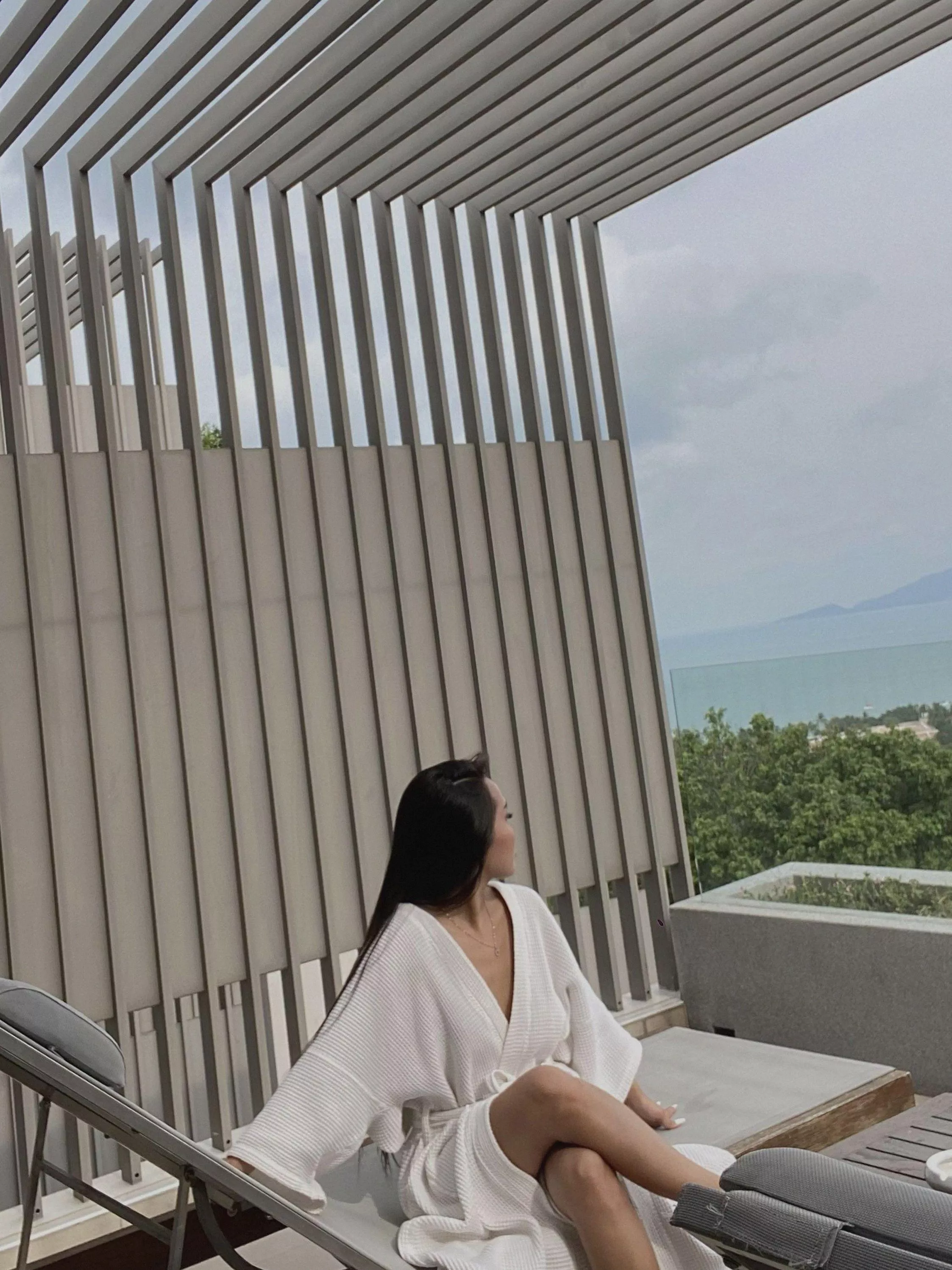 The Balcony's View is Stunning, But the Real Attraction Lies Inside That Robe