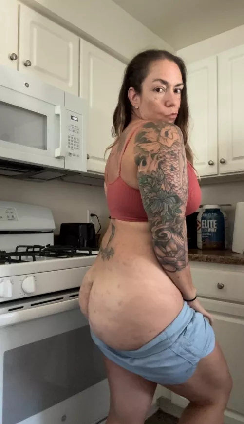 Naughty mommy in the kitchen