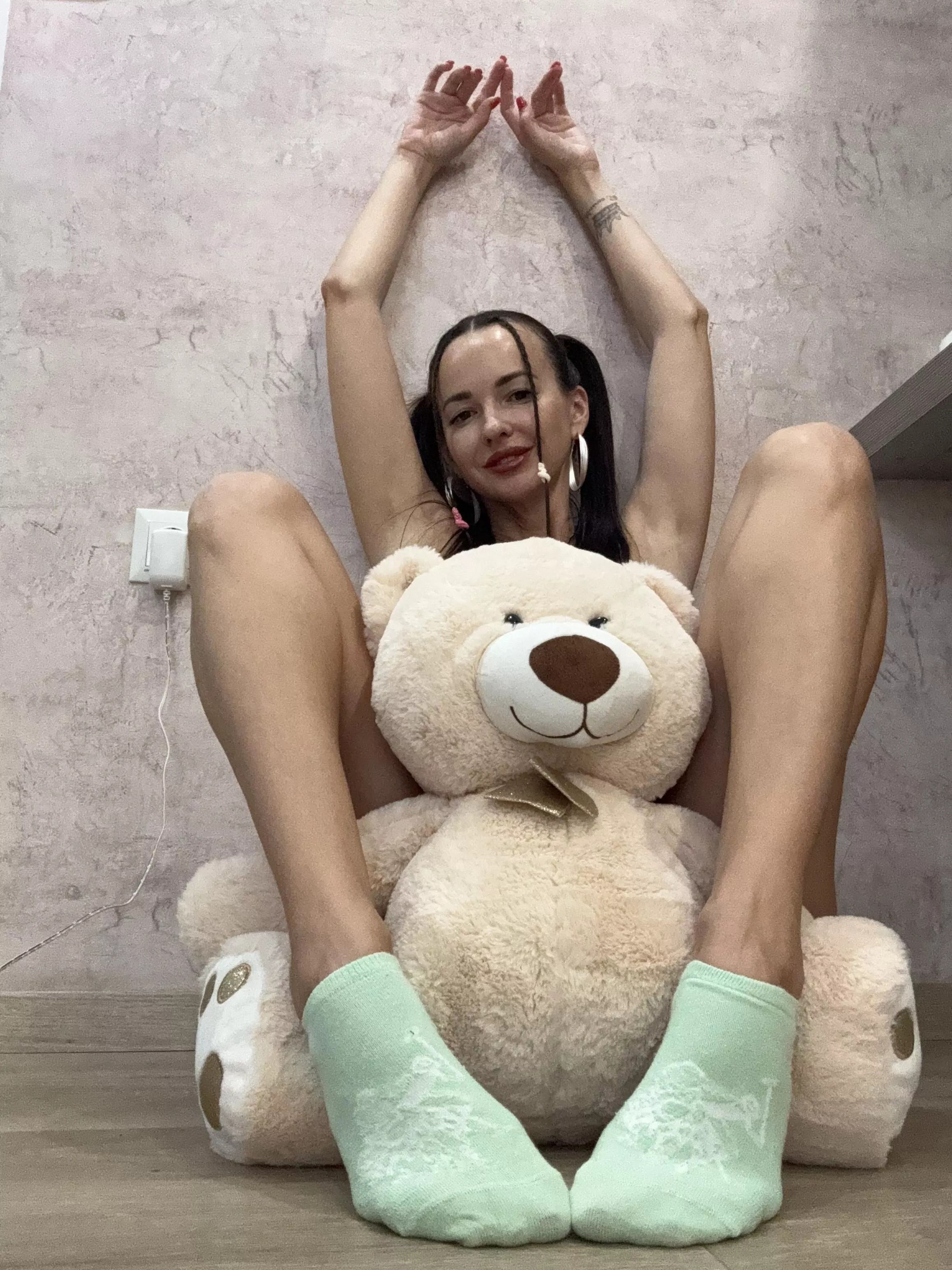 I would move the teddy bear away, but today all the attention is on my socks