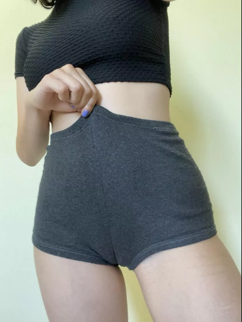 My lips engulf the shorts