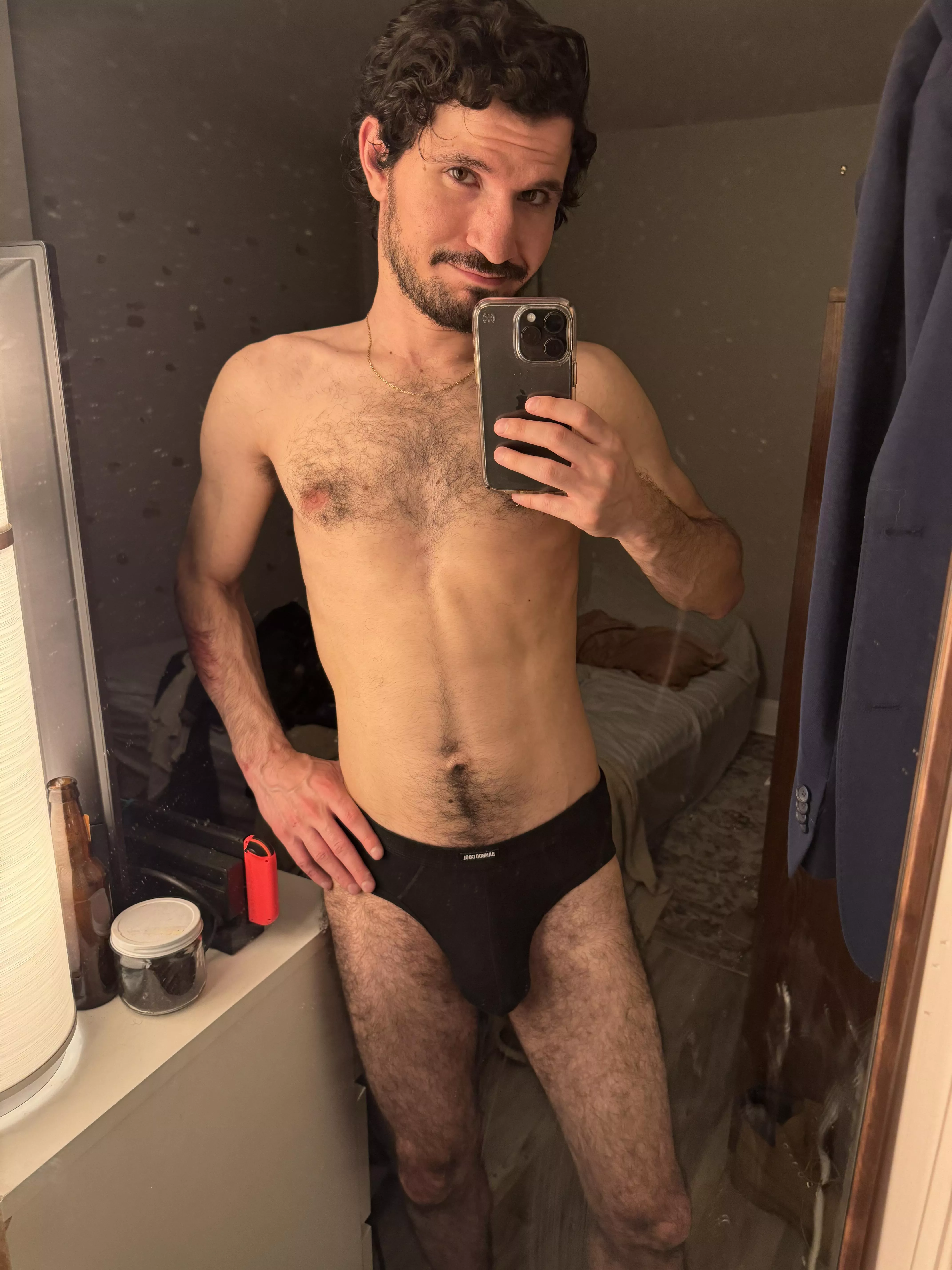 Hairy guy trying to look cute in his undies