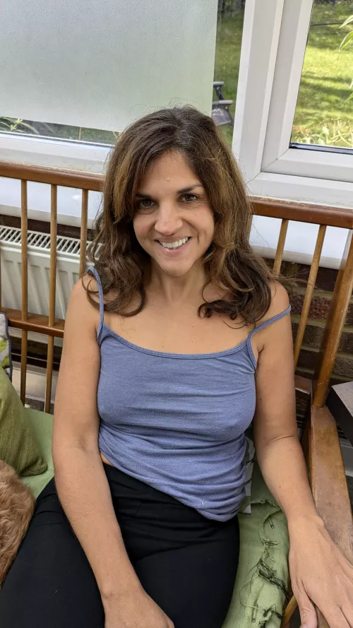 A mom relaxing at home doesn't need a bra