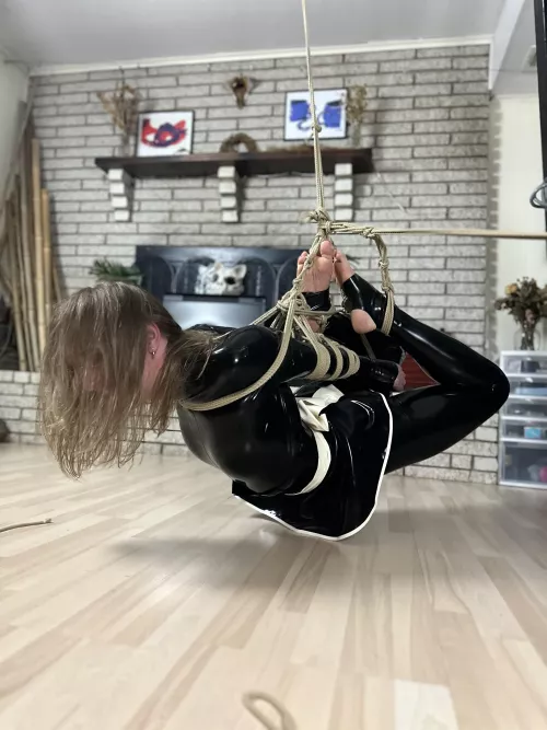 Hogtied only inches above the ground