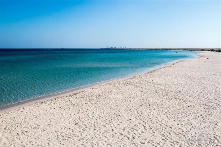 Sandy beach and blue endless sea
