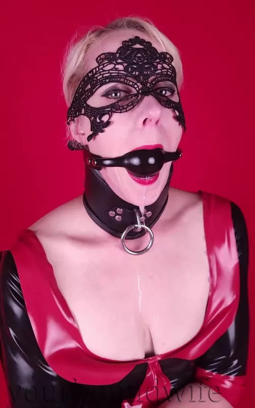 Collared, Gagged, and all shined up. 
