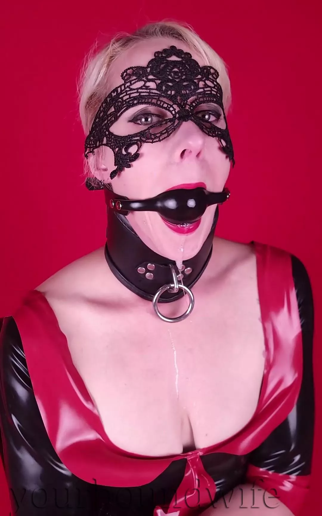 Collared, Gagged, and all shined up. 