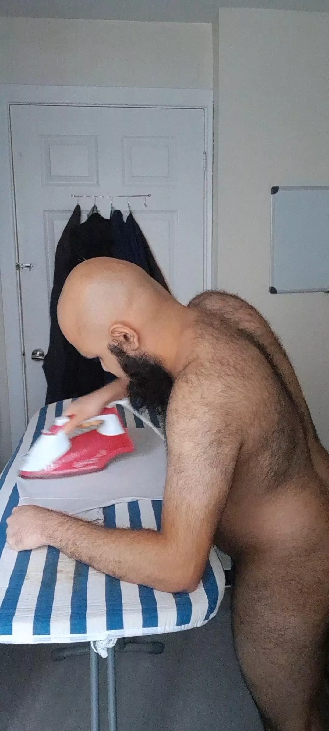 Ironing my cloths, being naked help with the heat