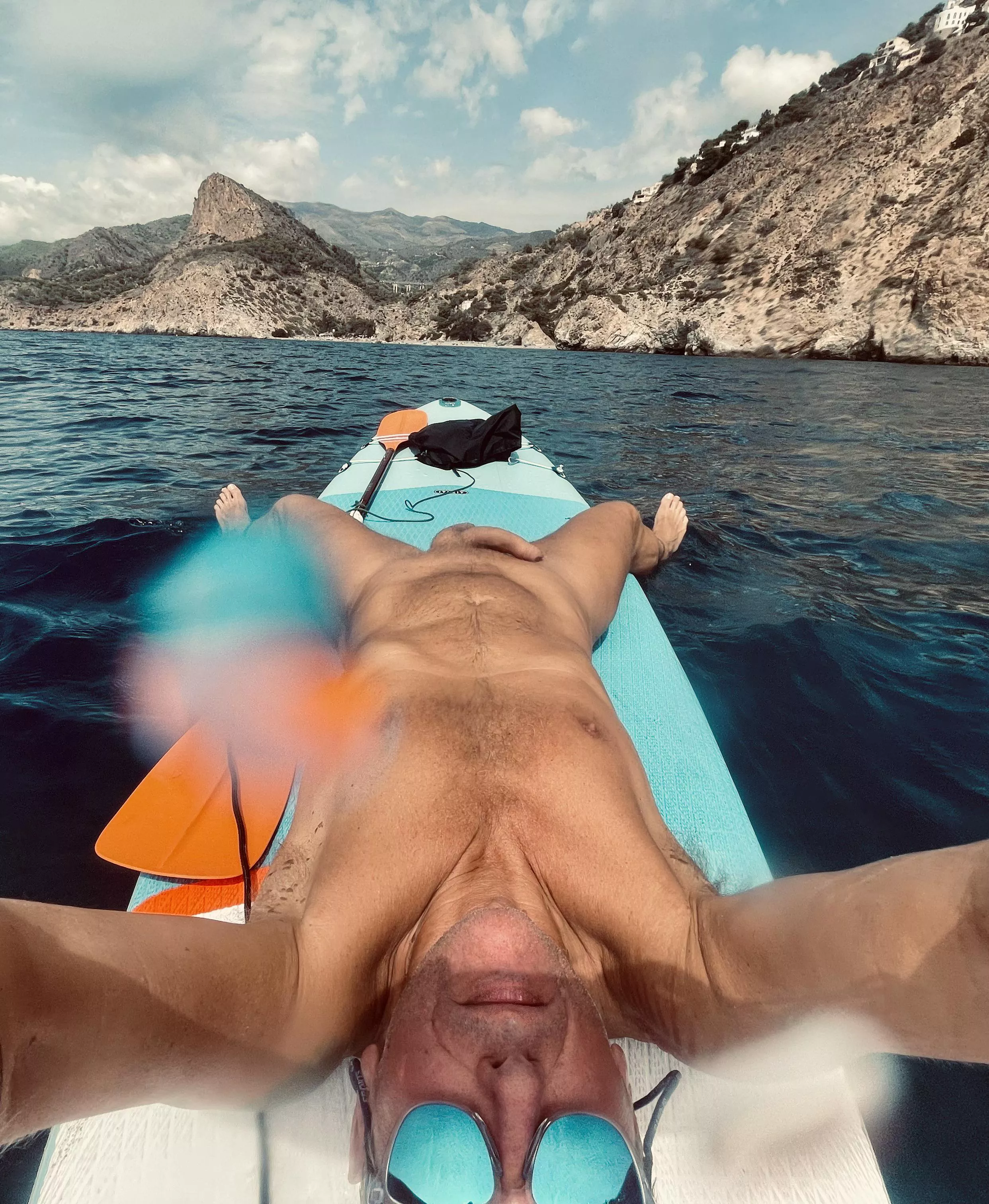 Naked Paddleboarding